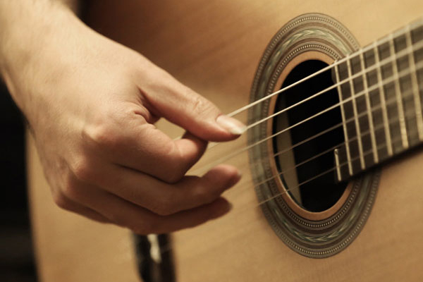 A close-up of right-hand position on the classical guitar